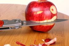 Apple With Knife Funny Wallpaper