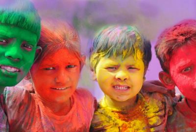 Children Celebrating and Playing Colorful Holi