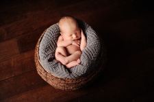 Baby Sleeping in Basket