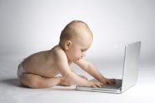 Cute Baby Learning With Laptop