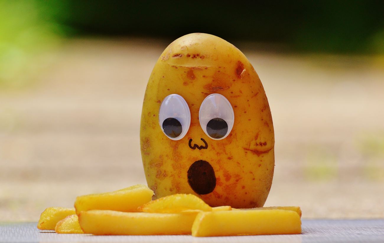 Potato With Googly Eyes and French Fries Funny Wallpaper