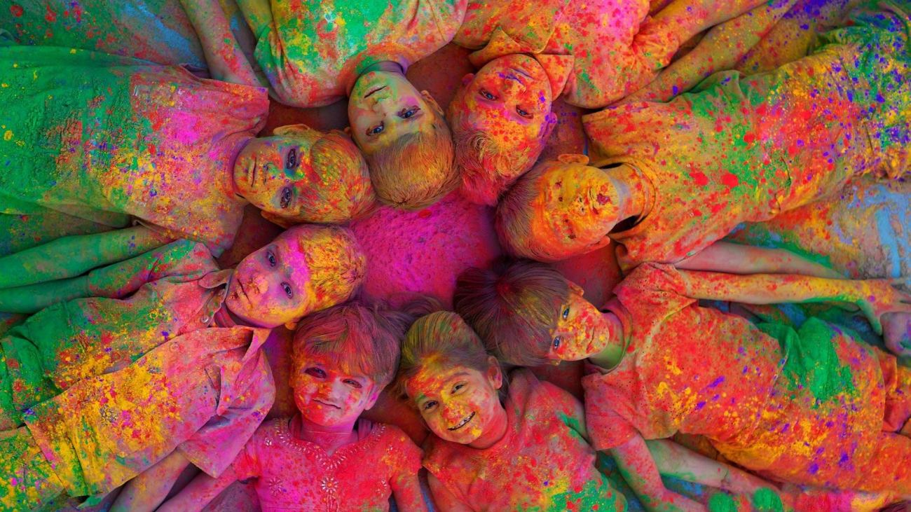 Beautiful Fun Photo of Children Celebrating and Enjoying Holi Colors