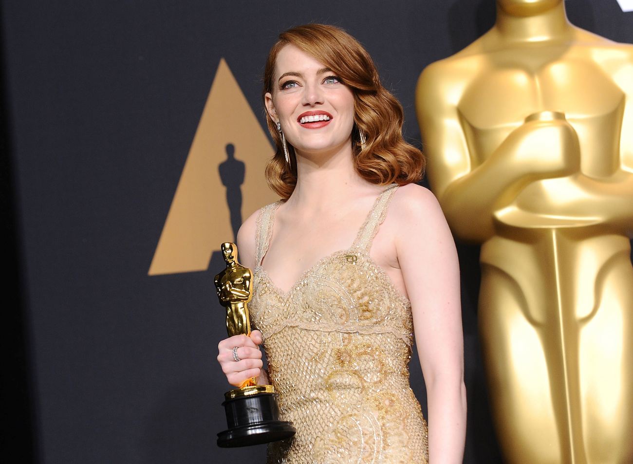 Emma Stone With Award Photo