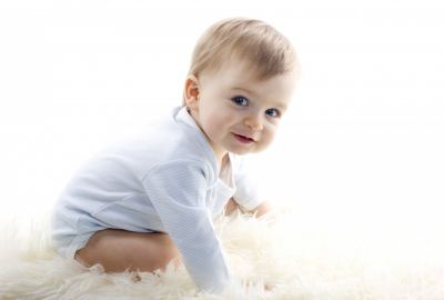 Cute Baby Boy on Fuffy Floor Photo