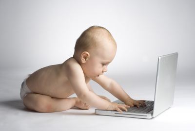 Cute Baby Learning With Laptop