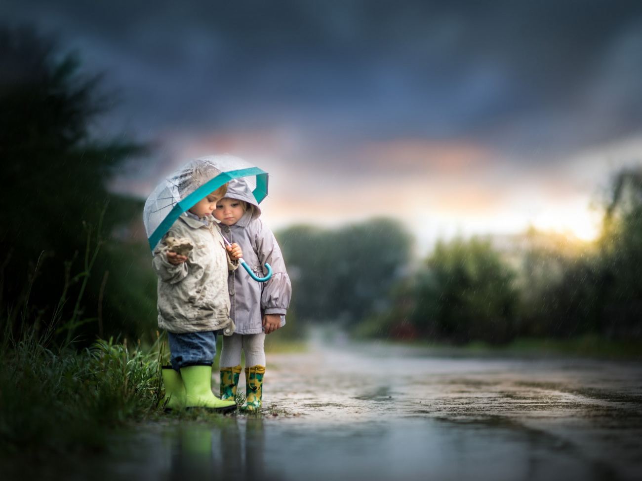 Little Boy and Little Girl With Umbrella